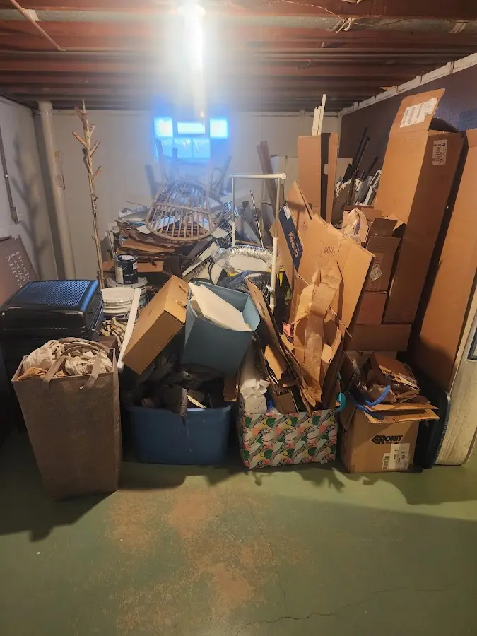 Roll-off dumpster container at job site for 15 Yard Dumpster Rental in Westwood